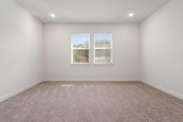 spare room with carpet flooring