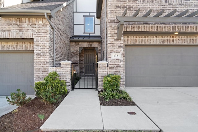 view of exterior entry featuring a garage