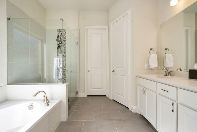 bathroom featuring vanity, tile patterned floors, and independent shower and bath