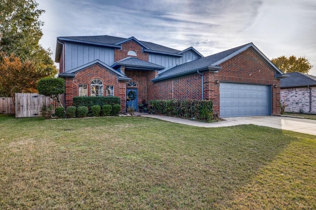 front facade with a front lawn and a garage