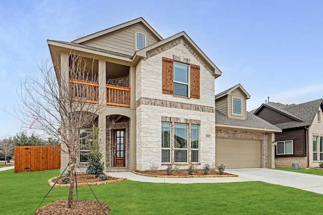 view of front of house featuring a garage, a balcony, and a front yard