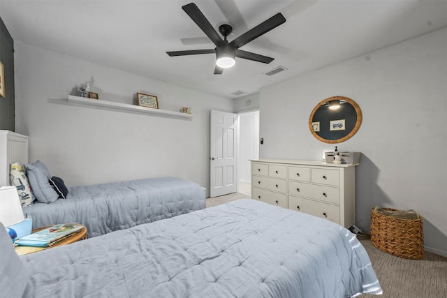 bedroom featuring light carpet and ceiling fan