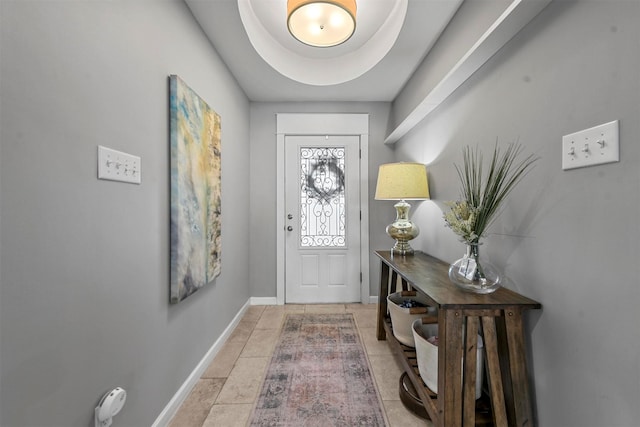 foyer entrance featuring tile patterned flooring