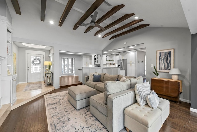 living room with hardwood / wood-style floors, lofted ceiling with beams, and ceiling fan