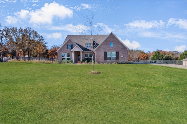 view of front of property with a front lawn