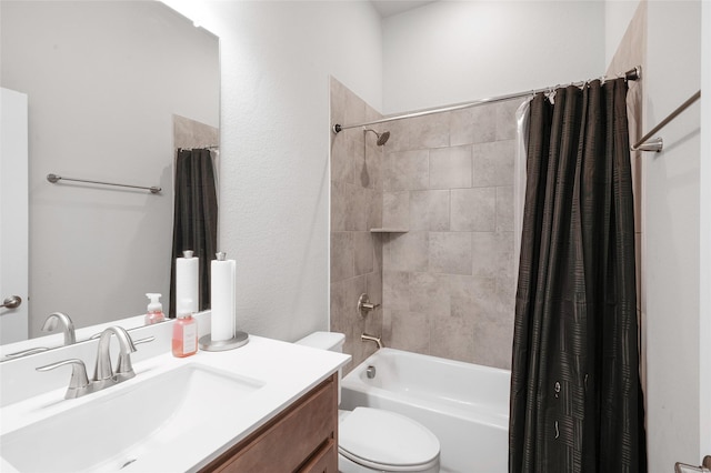 full bathroom with shower / bath combination with curtain, vanity, and toilet