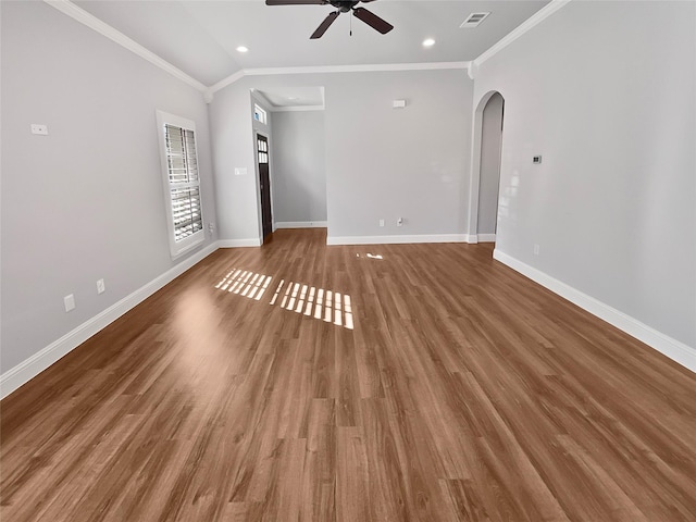 unfurnished living room featuring hardwood / wood-style flooring, ornamental molding, and ceiling fan