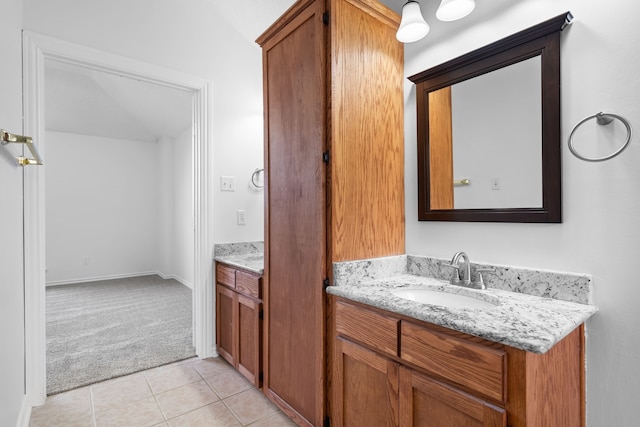 bathroom featuring tile patterned floors and vanity