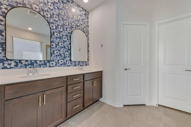 bathroom with vanity and tile patterned floors