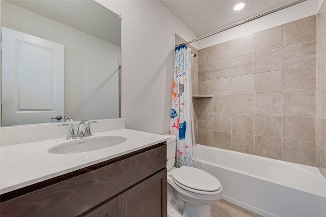 full bathroom featuring vanity, toilet, and shower / bathtub combination with curtain