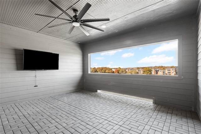 interior space featuring ceiling fan