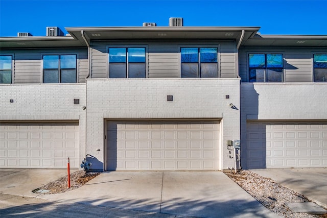 view of property featuring a garage