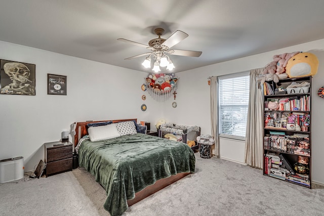 bedroom featuring ceiling fan and carpet floors