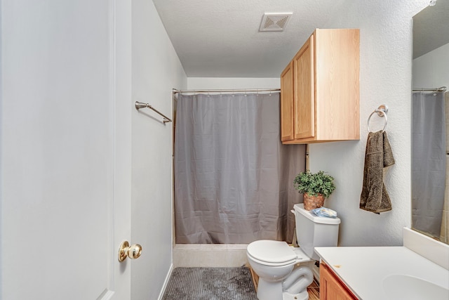 bathroom with a shower with shower curtain, vanity, toilet, and a textured ceiling