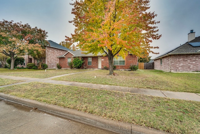 view of front of property with a front lawn