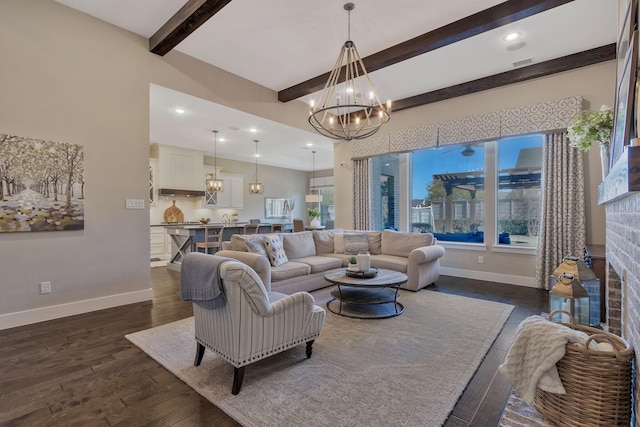 living room featuring dark wood-type flooring, a chandelier, and beamed ceiling