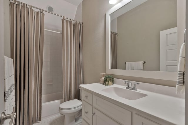 full bathroom with shower / bathtub combination with curtain, vanity, and toilet