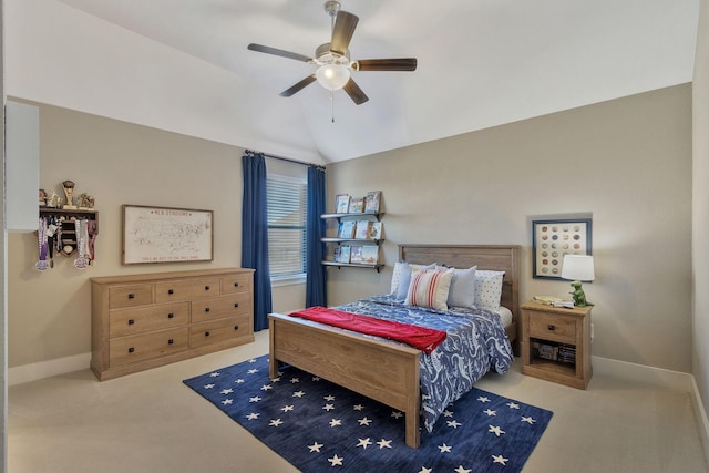 bedroom featuring ceiling fan, light colored carpet, and lofted ceiling