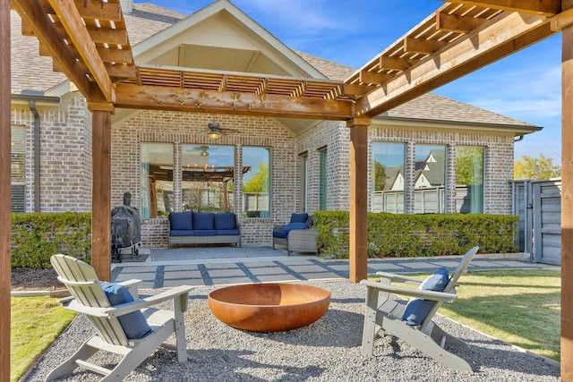 view of patio with grilling area, a pergola, and an outdoor hangout area