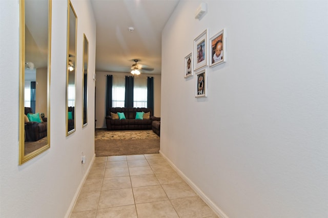 hallway with light tile patterned flooring