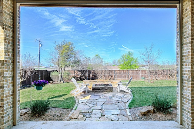 view of patio with a fire pit