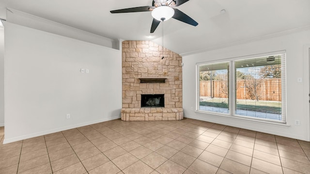 unfurnished living room featuring ceiling fan, light tile patterned floors, a fireplace, and lofted ceiling