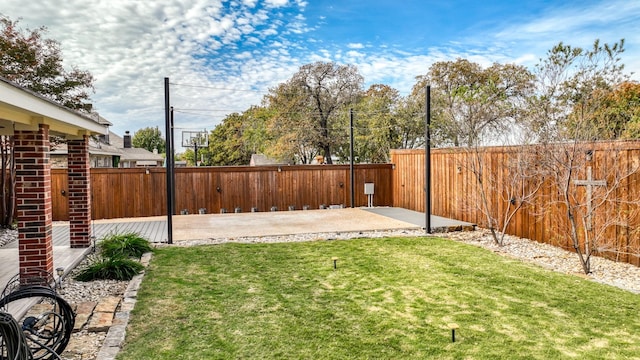 view of yard featuring a fenced backyard and a patio