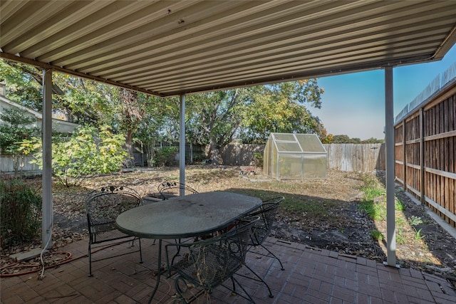 view of patio / terrace with an outdoor structure