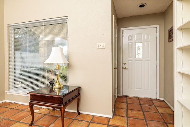 view of tiled foyer