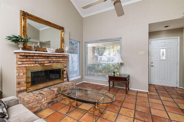 tiled living room featuring lofted ceiling, a brick fireplace, crown molding, and ceiling fan