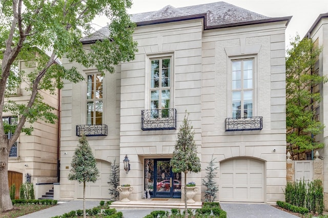 view of front of home with a garage