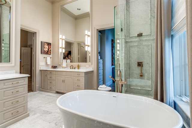 bathroom featuring a towering ceiling, a wealth of natural light, ornamental molding, vanity, and shower with separate bathtub