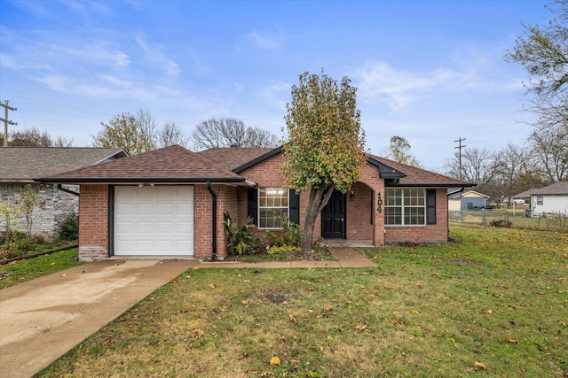 ranch-style house with a garage and a front lawn