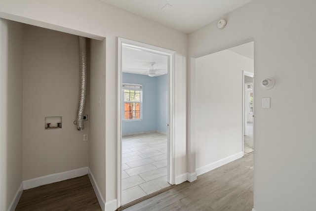 corridor featuring light hardwood / wood-style flooring