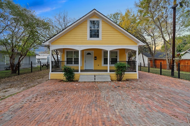 bungalow-style home with covered porch