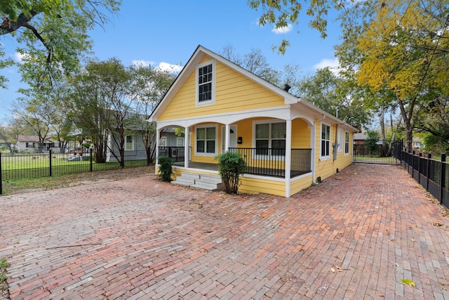 bungalow-style house featuring covered porch