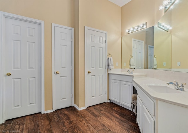 bathroom featuring hardwood / wood-style floors and vanity