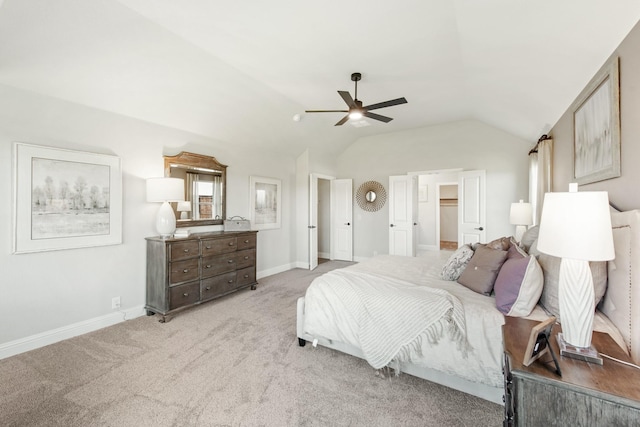 bedroom with lofted ceiling, light carpet, and ceiling fan