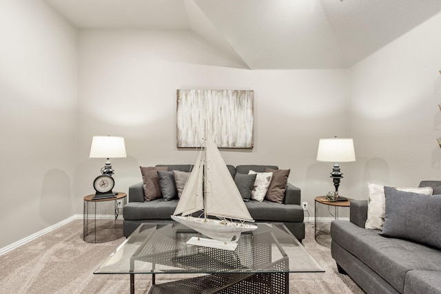 carpeted living room featuring lofted ceiling