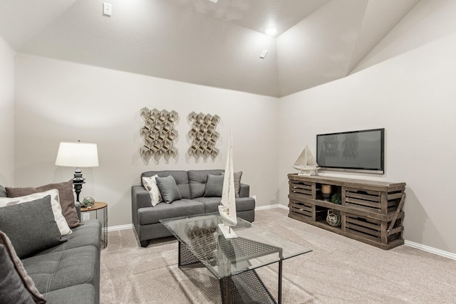 carpeted living room with lofted ceiling