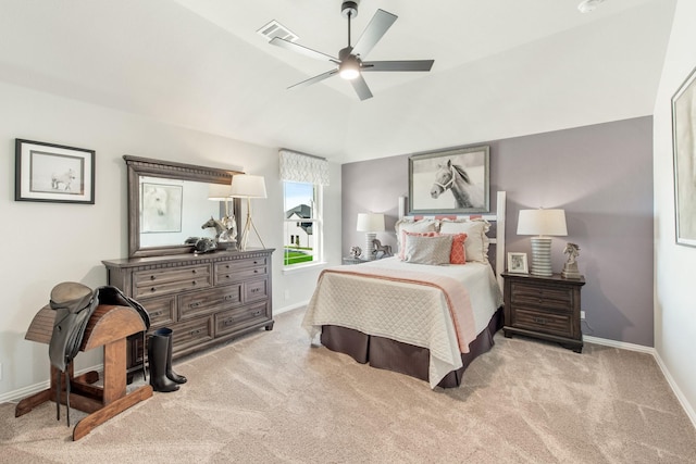 carpeted bedroom with vaulted ceiling and ceiling fan