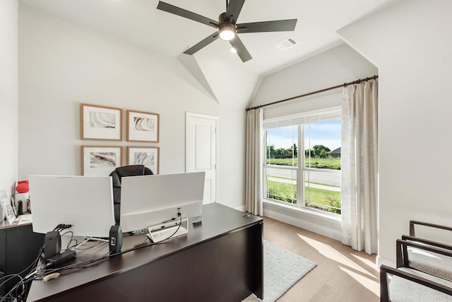 office area featuring vaulted ceiling, ceiling fan, and light hardwood / wood-style flooring