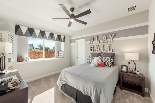 bedroom with lofted ceiling, light colored carpet, and ceiling fan