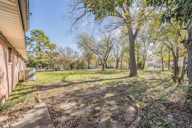 view of yard with central AC