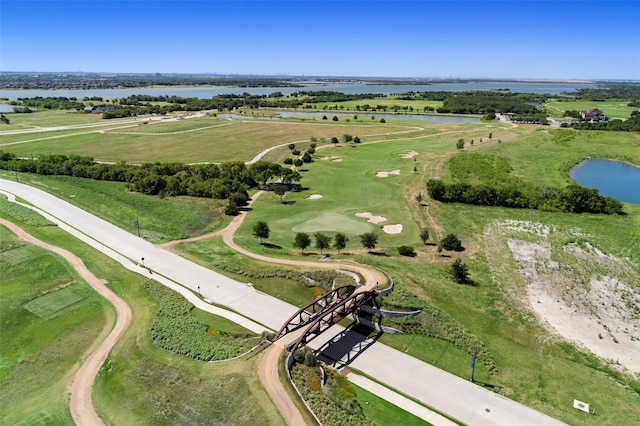 birds eye view of property with a rural view and a water view