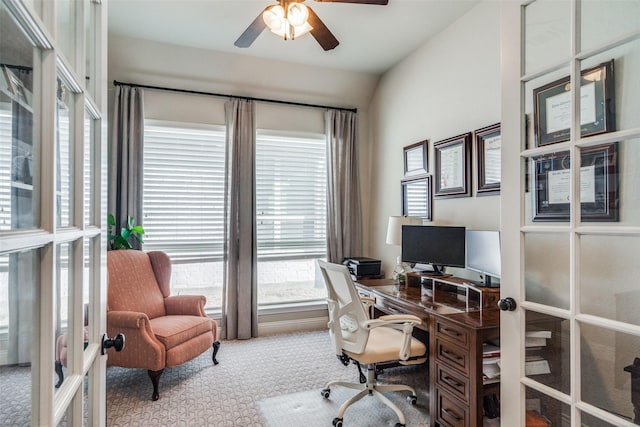 office area featuring light carpet, french doors, ceiling fan, and lofted ceiling