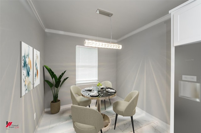 dining area featuring crown molding