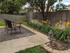 view of patio / terrace featuring an outdoor fireplace