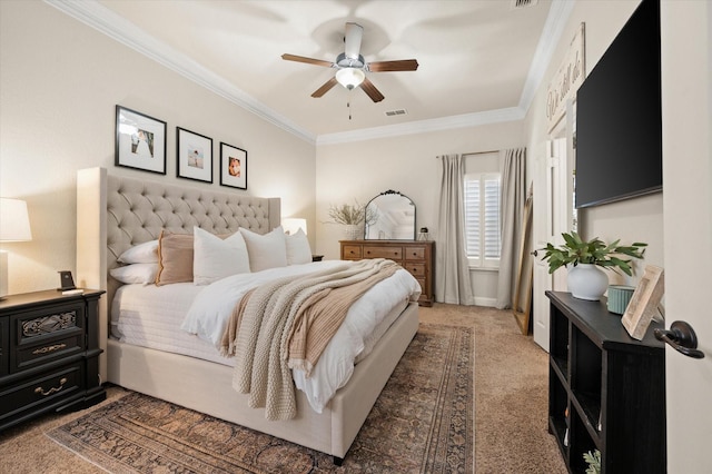 carpeted bedroom featuring ceiling fan and crown molding