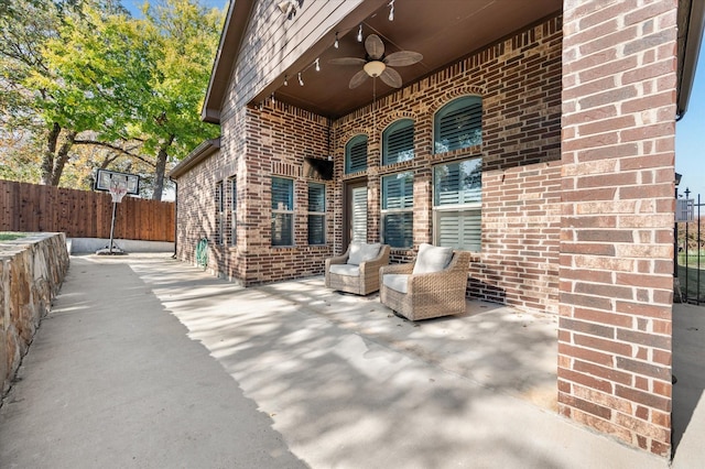 view of patio / terrace featuring ceiling fan